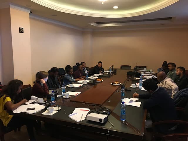 ECSLP training session with participants engaged in discussion